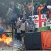 Rioters outside the hotel in Rotherham on Sunday. Pic: Reuters