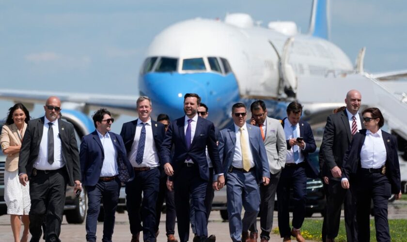 Being catty: Vance holds chat with press outside Kamala Harris’s plane (but runs away before spotting her)