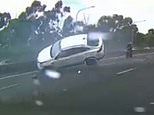 Heart-stopping moment SUV rolls down the M5 Motorway after being clipped by Holden driver during 'crazy' manoeuvre