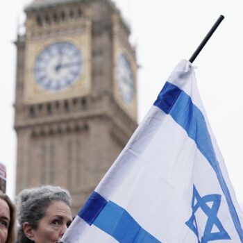 People take part in a march against antisemitism organised by the volunteer-led charity Campaign Against Antisemitism in Westminster, central London. Picture date: Sunday November 26, 2023.