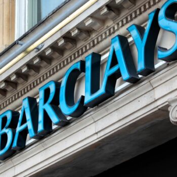 Sign above the entrance to a branch of Barclays Bank in Knightsbridge London.