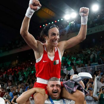 Imran Khelife celebrates after winning the fight. Pic: Reuters