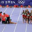 Terrifying moment medics rush to help collapsed French athlete Alessia Zarbo in the middle of Olympics 10,000m final - as race continues next to her