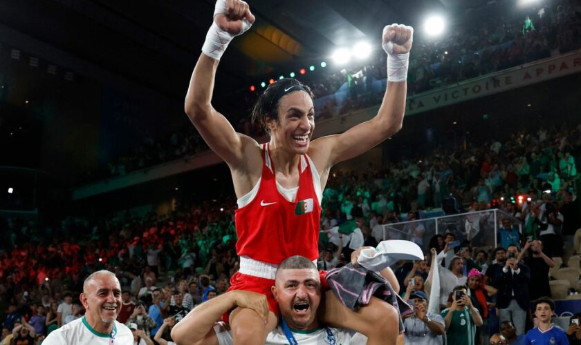 Imran Khelife celebrates after winning the fight. Pic: Reuters