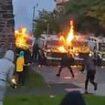 Police vans petrol bombed and officers injured in youngsters' violent 'nationalist' riots in Londonderry