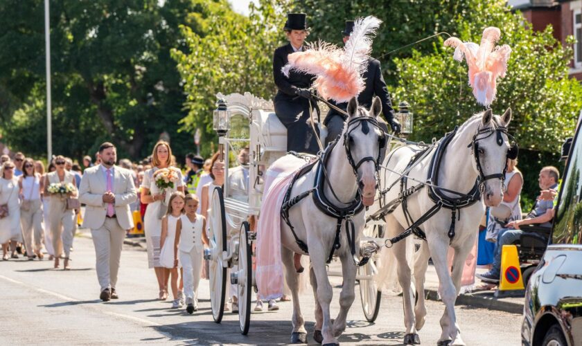 The horse-drawn carriage carrying the coffin of Southport stabbing victim Alice da Silva Aguiar arrives for her funeral at St Patrick's Church, Southport. The nine-year-old died in a knife attack at a dance class in Southport on July 29. Picture date: Sunday August 11, 2024. Picture date: Sunday August 11, 2024.