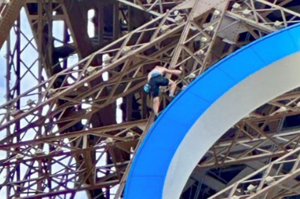 BREAKING: Brit climber arrested for scaling Eiffel Tower in Paris facing up to a year in prison