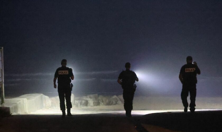 Police officers in France looking for migrant activity on 11 August