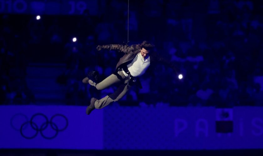 Paris Olympics closes with dystopian ceremony - and Tom Cruise abseiling into stadium