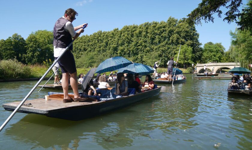 People enjoy punt tours along the River Cam in Cambridge. Picture date: Sunday August 11, 2024. Pic: PA