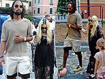 Madonna, 65, holds hands with new boyfriend Akeem Morris, 28, ahead of 66th birthday celebrations in Italy