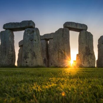 General view of the Stonehenge stone circle during the sunset, near Amesbury, Britain, as seen in this undated image provided to Reuters on July 29, 2020. English Heritage/A.Pattenden/Handout via REUTERS ATTENTION EDITORS - THIS IMAGE HAS BEEN SUPPLIED BY A THIRD PARTY.