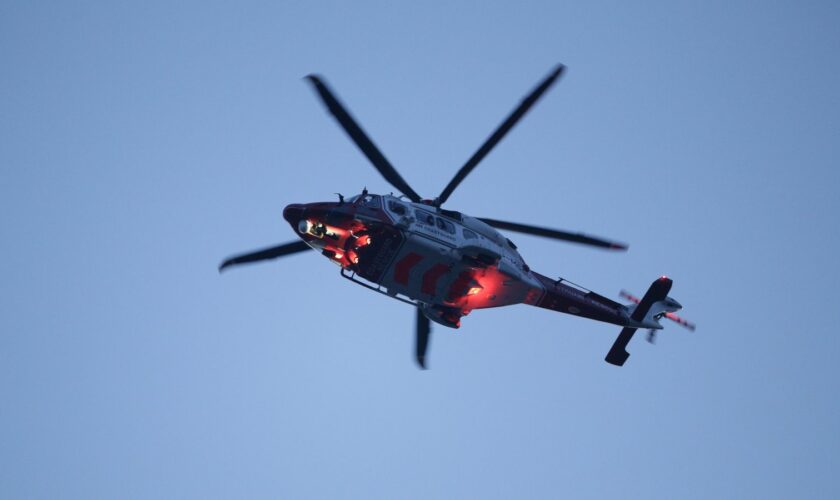 A Coastguard helicopter flies over St Thomas' Hospital in Westminster, London, to salute local heroes during Thursday's nationwide Clap for Carers NHS initiative to applaud NHS workers fighting the coronavirus pandemic.