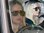 Molly-Mae Hague hides behind huge sunglasses after 55 minute showdown with Tommy: Star looks solemn as she leaves home after reuniting with boxer Fury for first time since shock split