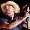 Jason Aldean reunites military family with onstage surprise