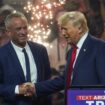 Republican presidential nominee and former U.S. President Donald Trump shakes hands with former independent presidential candidate Robert F. Kennedy Jr. during a rally in Glendale, Arizona, U.S., August 23, 2024. REUTERS/Go Nakamura