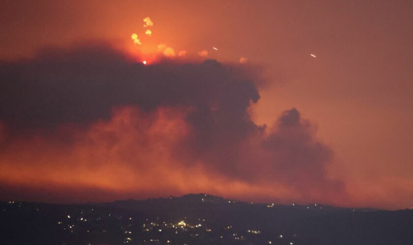 A view shows smoke on the Lebanese side of the border with Israel, after Israel said it had noted armed group Hezbollah preparing to attack Israel and had carried out pre-emptive strikes on Hezbollah targets in Lebanon, as seen from Tyre, southern Lebanon August 25, 2024. REUTERS/Aziz Taher