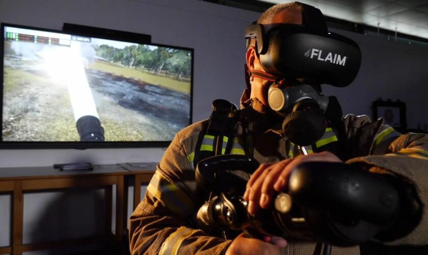 Mick Dewer from the Fire Service College practising with the VR kit.