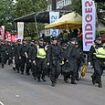 Woman stabbed on 'family day' at Notting Hill Carnival was with her young child, Met reveals: Police chief says he is 'tired of saying the same words every year' as event is once again marred by violence - with officers braced for more trouble today