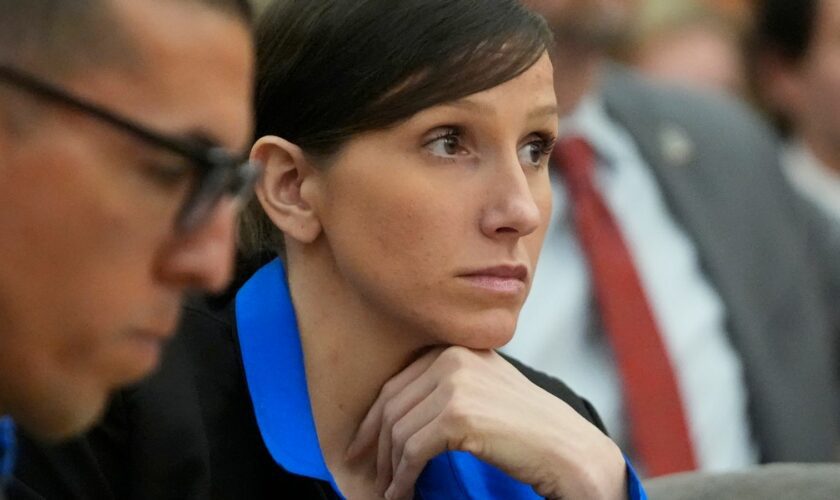 Kouri Richins, a Utah mother of three who wrote a children's book about coping with grief after her husband's death and was later accused of fatally poisoning him, looks on during a hearing Tuesday, Aug. 27, 2024, in Park City, Utah. (AP Photo/Rick Bowmer, Pool)