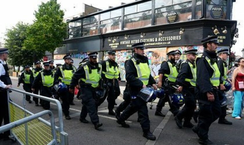 Police officers in Ladbroke Grove for the closing day of the celebrations. Pic: PA