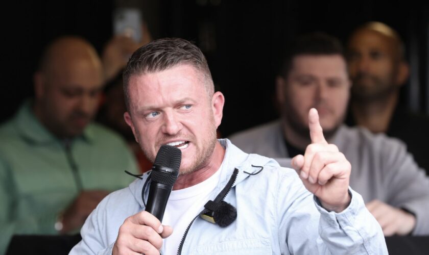 Tommy Robinson, whose real name is Stephen Yaxley Lennon, speaks during a protest march at Parliament Square in London. Groups from across the UK linked to football disorder are expected to attend the event the Metropolitan Police said. Picture date: Saturday June 1, 2024. PA Photo. A static counter-protest, organised by Stand Up To Racism, will take place in Whitehall from midday. See PA story POLICE Protest. Photo credit should read: David Parry/PA Wire