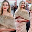 Angelina Jolie puts her protracted divorce to one side as she attends the 81st Venice Film Festival premiere of Maria in a sweeping floor-length gown... after hinting at the 'despair' and 'pain' of her separation from Brad Pitt