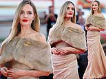 Angelina Jolie puts her protracted divorce to one side as she attends the 81st Venice Film Festival premiere of Maria in a sweeping floor-length gown... after hinting at the 'despair' and 'pain' of her separation from Brad Pitt