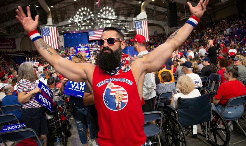 A supporter dances at a Trump campaign rally in Johnstown. Pic: AP