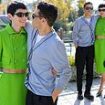 Emma Corrin, 28, dazzles in a lime green co-ord as they put on a very loved up display with boyfriend Rami Malek, 43, at the Venice Film Festival