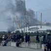 'Loud bangs and explosions' heard near the O2 as videos show huge plumes of smoke pouring into the air