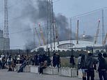 'Loud bangs and explosions' heard near the O2 as videos show huge plumes of smoke pouring into the air