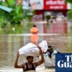 Bangladeshis taking refuge in emergency shelters after heavy flooding