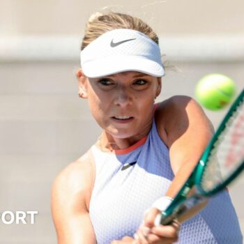 Katie Boulter hits a return in her US Open match against Aliaksandra Sasnovich