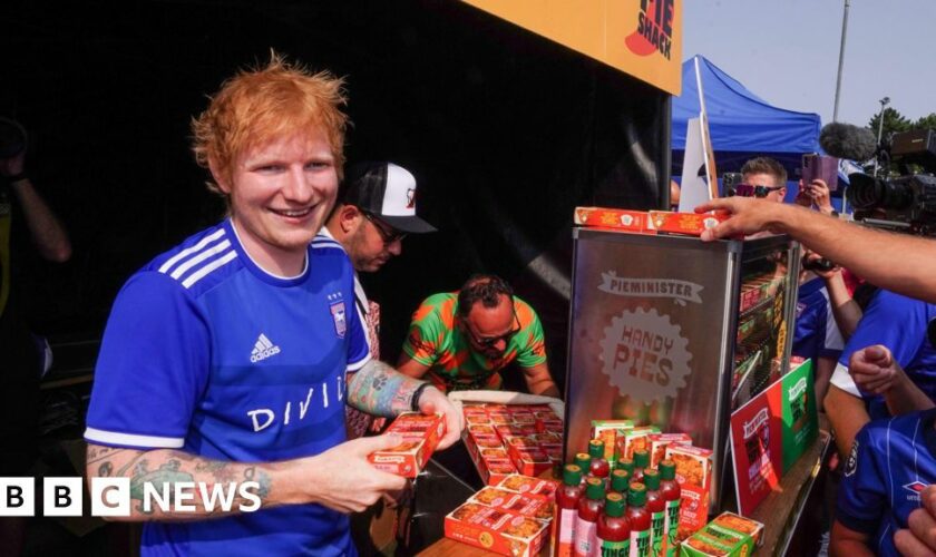 Ed Sheeran hands out pies to Ipswich Town fans