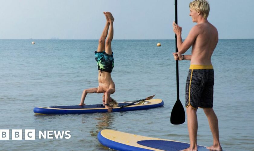 Four paddleboarders rescued amid holiday warning