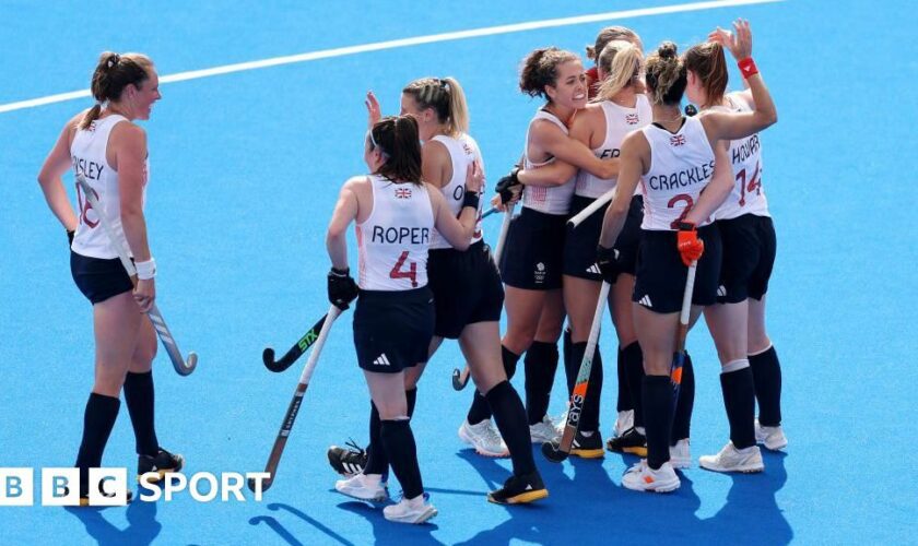 Great Britain celebrate after scoring against the United States