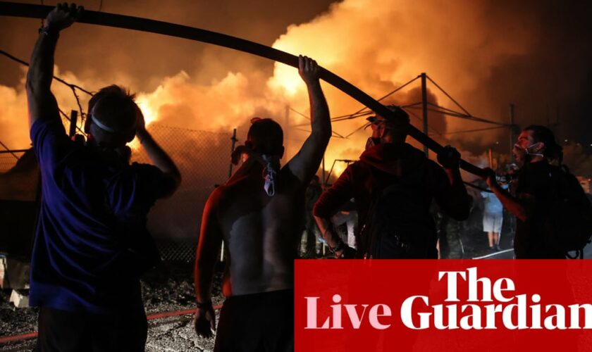 Greek minister says wildfires reduced to ‘scattered hotspots’ – live updates