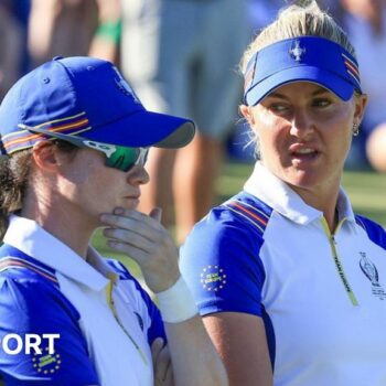 Europe's Leona Maguire and Charley Hull chatting during their fourball match against the US in 2023