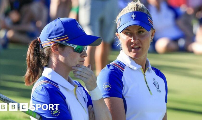 Europe's Leona Maguire and Charley Hull chatting during their fourball match against the US in 2023