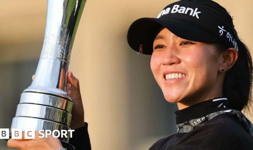 Lydia Ko with the AIG Women's Open trophy