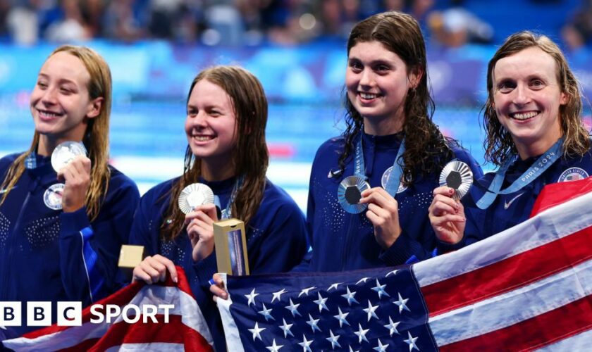 Paige Madden, Erin Gemmell, Claire Weinstein and Katie Ledecky celebrate silver