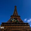 Man held for climbing Eiffel Tower on final Olympics day