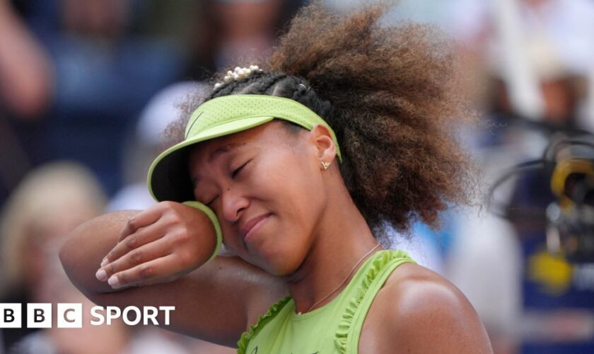 Naomi Osaka wipes away a tear at the US Open