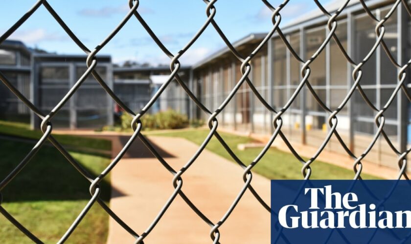 Prison guard charged with sexually assaulting inmate three times at NSW jail