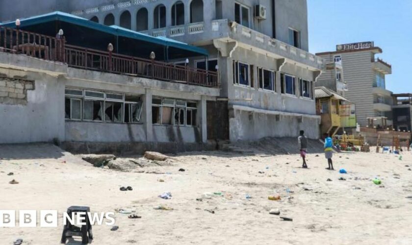 Suicide bomber and gunmen kill 32 on busy Somalia beach, police say