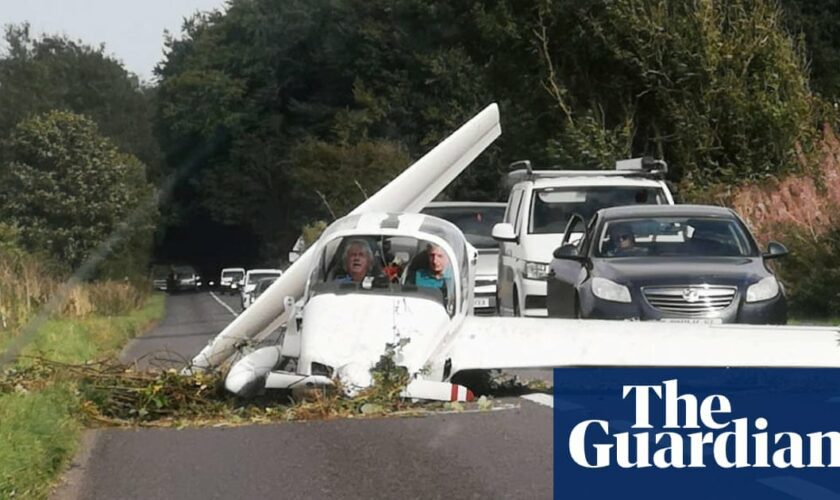 Two pilots survive light aircraft crash on busy road in Gloucestershire