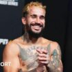 Ramon Taveras smiles backstage at a UFC event