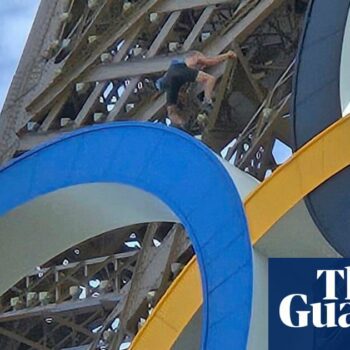 ‘Bloody warm, innit?’ says man scaling Eiffel Tower on last day of Olympics