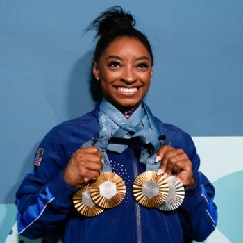 Simone Biles corrects a sign that miscalculated her number of gold medals